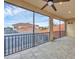 Screened patio with beautiful views of a nearby pool and rooftops creating a relaxing outdoor living space at 261 Portofino Dr, North Venice, FL 34275