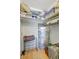 Organized closet with shelves, hanging rods, and storage containers, perfect for maximizing space at 2808 60Th W Ave # 1603, Bradenton, FL 34207