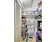 Storage closet with shelves stocked with household supplies and cleaning equipment, offering ample space at 2808 60Th W Ave # 1603, Bradenton, FL 34207