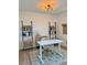 Bright home office featuring white desk, modern shelving, and stylish decor elements at 2904 N Ola Ave, Tampa, FL 33602