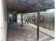 Covered patio area with stone pavers and backyard views at 3212 Florida Blvd, Bradenton, FL 34207