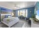 Cozy bedroom showcasing a bay window, a comfortable seating area, and serene decor at 3408 Brookridge Ln, Parrish, FL 34219