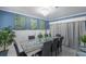 Stylish dining room featuring elegant decor, ample seating and plenty of natural light at 3408 Brookridge Ln, Parrish, FL 34219