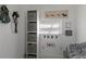 Charming dog room with custom storage, playful decor, and cozy dog crate at 3408 Brookridge Ln, Parrish, FL 34219