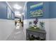 Bright foyer with stylish decor and calming colors, creating a welcoming atmosphere in the home's entrance at 3408 Brookridge Ln, Parrish, FL 34219