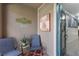 Welcoming front porch with cozy seating and decorative touches, creating a pleasant entrance to the home at 3408 Brookridge Ln, Parrish, FL 34219