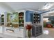 Open-concept living area with fireplace, built-in shelving, and decor with easy access to adjacent rooms at 3408 Brookridge Ln, Parrish, FL 34219