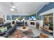 Cozy living room featuring a fireplace, comfortable seating, and stylish decor for relaxing and entertaining at 3408 Brookridge Ln, Parrish, FL 34219
