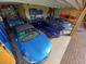 Three-car garage displaying organized storage and convenient parking space at 3572 Peace River Dr, Punta Gorda, FL 33983