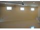 Large garage featuring recessed lighting, clean walls, and epoxy flooring at 3572 Peace River Dr, Punta Gorda, FL 33983