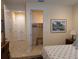 Cozy bedroom with access to closets and storage space, as well as classic furnishings at 3572 Peace River Dr, Punta Gorda, FL 33983