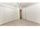 Bright bedroom featuring a ceiling fan, wood-look flooring, and a closet at 3749 Albatros Ln, North Port, FL 34288