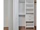 Walk-in closet with shelving and drawers at 3838 Manorwood Loop, Parrish, FL 34219