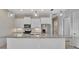 Modern kitchen featuring granite countertops, stainless steel appliances, and pendant lighting at 3838 Manorwood Loop, Parrish, FL 34219
