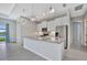 Modern kitchen featuring granite countertops, stainless steel appliances, and pendant lighting at 3838 Manorwood Loop, Parrish, FL 34219