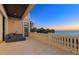 Balcony with seating area, offering amazing views of the ocean at sunset at 3909 Casey Key Rd, Nokomis, FL 34275