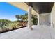 Covered outdoor shower area with tile wall and a view of the surrounding landscape at 3909 Casey Key Rd, Nokomis, FL 34275