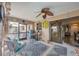 Relaxing Florida room with a ceiling fan, comfortable seating and view to the exterior at 392 Yeager St, Port Charlotte, FL 33954