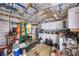 Interior of outbuilding with white cabinets and lots of storage space at 392 Yeager St, Port Charlotte, FL 33954