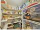 Organized pantry with shelving and extra storage and decorative accents at 392 Yeager St, Port Charlotte, FL 33954