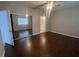 Spacious bedroom with hardwood floors, fan, and walk-in closet at 3958 Mediterranea Cir # 411, Sarasota, FL 34233