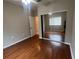 A bedroom is enhanced with a ceiling fan, door to a full bathroom and a mirrored closet at 3958 Mediterranea Cir # 411, Sarasota, FL 34233