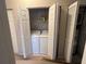 Functional laundry closet with washer and dryer at 3958 Mediterranea Cir # 411, Sarasota, FL 34233