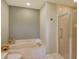 Elegant bathroom with soaking tub and glass-enclosed shower, providing a spa-like experience at 4141 Entrada Ct, Sarasota, FL 34238
