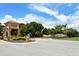 Mira Lago's beautiful gated community entrance with lush landscaping and picturesque views of the surrounding area at 4141 Entrada Ct, Sarasota, FL 34238