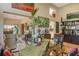 Elegant dining area featuring a glass table, stylish chairs, and views into the living room at 4141 Entrada Ct, Sarasota, FL 34238