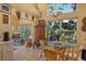 Bright kitchen and breakfast nook with natural light and backyard views at 4141 Entrada Ct, Sarasota, FL 34238