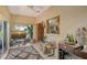 Bright living room featuring neutral walls and access to a screened lanai at 4141 Entrada Ct, Sarasota, FL 34238