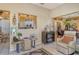 Bright living room showcasing stylish decor, comfortable seating, and seamless transitions to dining and kitchen at 4141 Entrada Ct, Sarasota, FL 34238