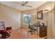 Cozy office space with desk, comfortable chair, and ample natural light for productivity at 4141 Entrada Ct, Sarasota, FL 34238