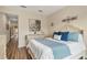 Comfortable bedroom featuring a plush bed, dresser and tasteful decor at 4210 Overture Cir, Bradenton, FL 34209