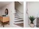 Welcoming entryway with staircase, stylish decor, and elegant furnishings at 4210 Overture Cir, Bradenton, FL 34209