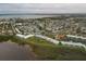 Wide aerial view showcasing the community's proximity to the waterfront and surrounding neighborhoods at 4753 Independence Dr, Bradenton, FL 34210