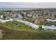 Community aerial view featuring waterfront properties, green spaces, and recreational amenities at 4753 Independence Dr, Bradenton, FL 34210