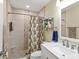 Updated bathroom with a walk-in shower and modern fixtures at 4753 Independence Dr, Bradenton, FL 34210