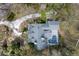 Overhead view of home, pool, and patio featuring a screen enclosure and lush landscaping at 4871 Hoyer Dr, Sarasota, FL 34241