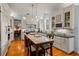 Spacious kitchen features white cabinets, granite counters and a butcher block island with seating at 4871 Hoyer Dr, Sarasota, FL 34241