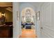 A bright living room offers a high ceiling with arched window, and coordinated furniture at 4871 Hoyer Dr, Sarasota, FL 34241