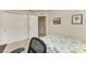 Bright bedroom featuring a closet and neutral decor, creating a calm atmosphere at 5015 98Th E Ave, Parrish, FL 34219