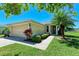 Inviting single-Gathering home featuring a 2-car garage and neatly landscaped front yard at 5015 98Th E Ave, Parrish, FL 34219
