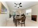 Open living room and dining room with abundant natural light and comfortable seating arrangements at 5015 98Th E Ave, Parrish, FL 34219
