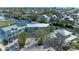 Aerial view of the homes in the neighborhood with a waterfront view at 511 Loquat Dr, Anna Maria, FL 34216