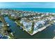 Waterfront property with boat lifts, private pool, and lush landscaping at 511 Loquat Dr, Anna Maria, FL 34216