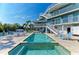 Charming waterfront home boasts a private pool, patio, and boat dock for waterfront living at 511 Loquat Dr, Anna Maria, FL 34216