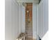 Convenient outdoor shower with wooden accents and privacy dividers, perfect after a swim at 511 Loquat Dr, Anna Maria, FL 34216