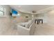 Beautiful recreation room features a cozy seating area and foosball table at 511 Loquat Dr, Anna Maria, FL 34216